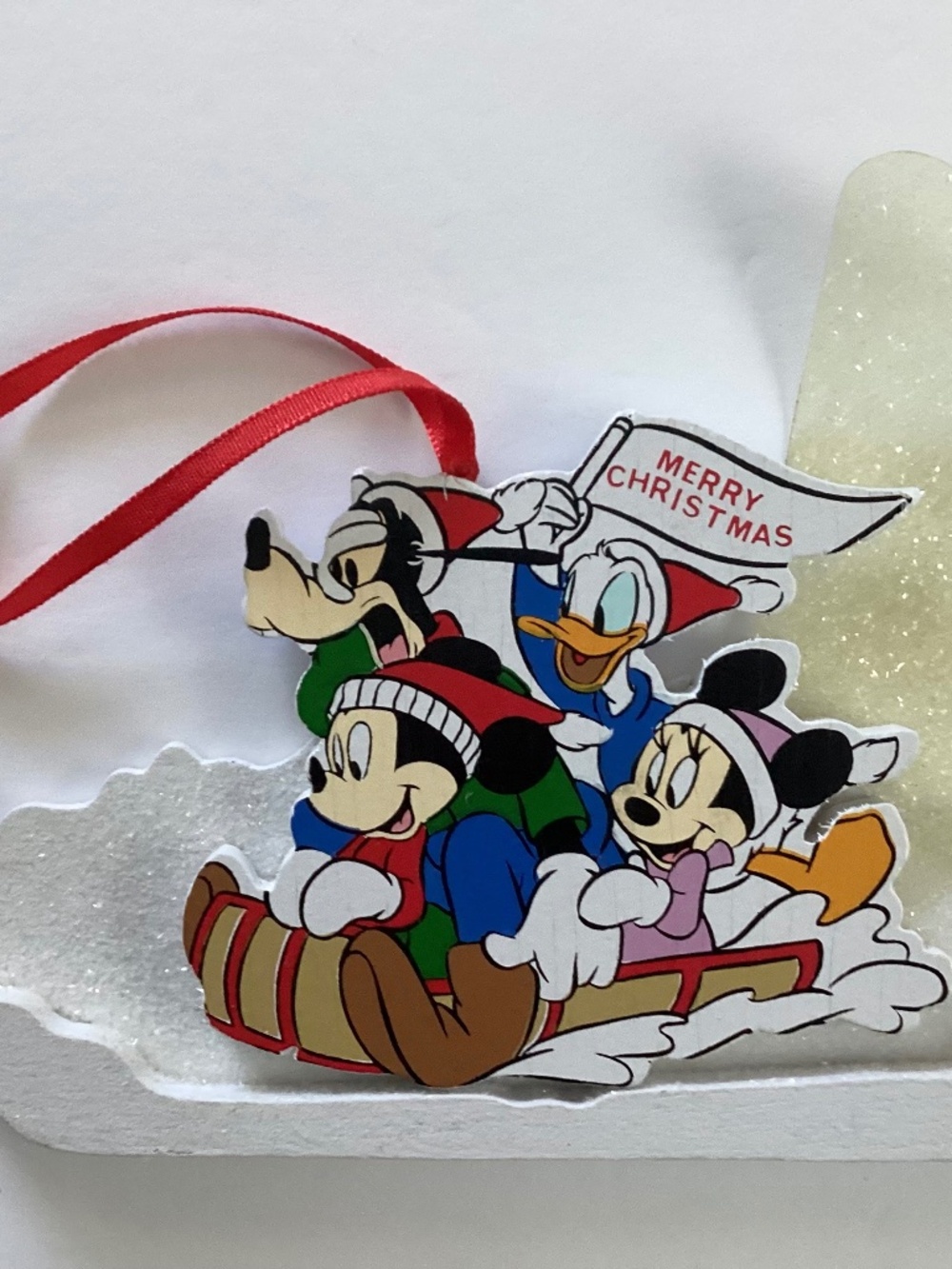 The Walt Disney Company Wooden Christmas Ornament Mickey and Friends Sledding